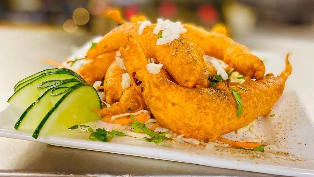 Mirchi Bhajji · Mirchi coated with a mixture of spices, gram flour and batter fried.