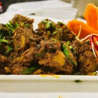 Mutton Sukha · Goat pieces cooked with special south Indian spices.
