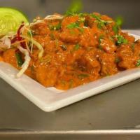 Manchurian · Marinated chicken tossed with spices and manchurian sauce.