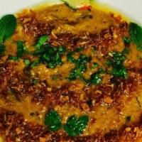 Goat Haleem · Slow cooked for seven to eight hours, which results in a paste-like consistency, blending th...