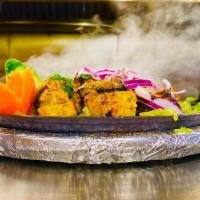 Fish Tikka · Fish marinated with tandoor spices and then grilled in a tandoori.