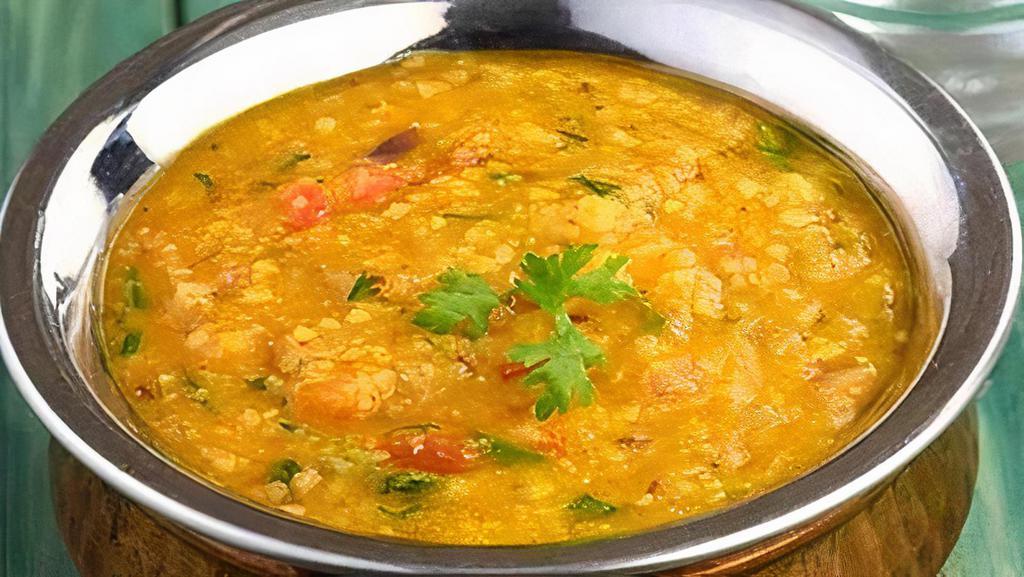 Dal Fry · Lentil cooked with onion, tomato, tempered in homemade ghee. Rice will NOT be served with Entrees.