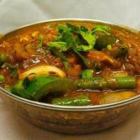Chettinad Vegetable Curry · Flavorful and spicy curry prepared using vegetables, coconut and special spices. Rice will N...