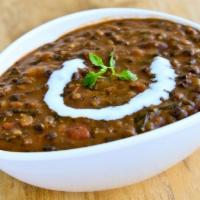 Dal Makhani · Pulses cooked with butter and some grounded spices .