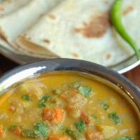 Andhra Veg Korma · Mixed vegetables cooked in a creamy rich sauce made up of yogurt, almonds and curry leaves. ...