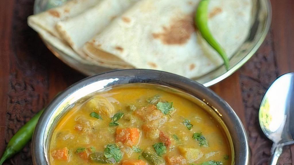 Andhra Veg Korma · Mixed vegetables cooked in a creamy rich sauce made up of yogurt, almonds and curry leaves. Rice will NOT be served with Entrees.