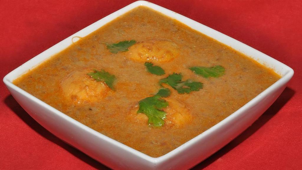 Andhra Style Curry · Chicken cooked in a special spicy gravy. Rice will NOT be served with Entrees.