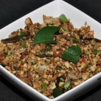Anda Bhurji · egg scrambled with spices and curry leaves added to that.Rice will NOT be served with Entrees.