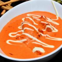 Butter Chicken · Boneless chicken cubes grilled in tandoor and then cooked with rich cream butter sauce. Rice...