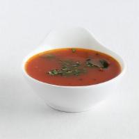 Rasam Soup · Traditional Indian flavored tamarind, garlic and black pepper soup.