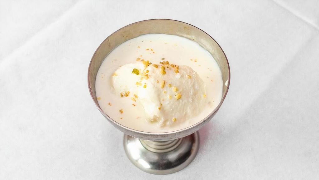 Rasmalai · Pressed cheese, pistachios, condensed milk