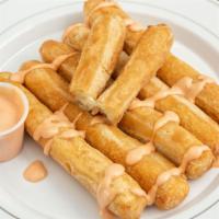 Tequenos/ Cheese · cheese mozzarella sticks with pink sauce on the side. $2.30 each