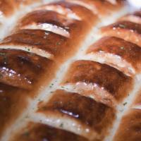 Garlic Bread · Whole loaf, topped with garlic and olive oil or butter, herb seasoning, baked to perfection....