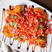 Semi Freddo · Golden fried chicken or veal cutlets topped with fresh diced plum tomatoes, red onions and b...