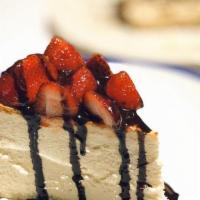 New York Cheesecake · fresh strawberries, valrhona fudge, and hazelnut crunch