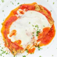 Eggplant Parmigiana · Eggplant baked in tomato sauce, melted mozzarella, grated cheese. Served with side of penne ...