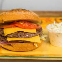 Beef Cheeseburger · Two patties. Served on a kaiser roll with a pickle and coleslaw. Includes lettuce, tomato, a...