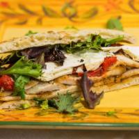 The Nissan Sandwich · Grilled chicken, field greens, roasted red peppers, fresh Mozzarella with a balsamic glaze. ...
