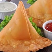 Potli Samosa (2 Pieces) · Mildly spiced potatoes, peas stuffed in a light pastry, deep fried until crisp and served wi...