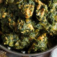 Chicken Saagwala · Boneless seasoned thigh meat cooked in fresh creamed spinach.