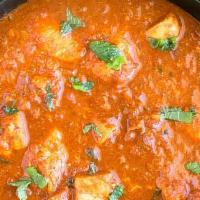 Chicken Vindaloo · Boneless cooked with Goan tangy-spicy special vindaloo sauce with wine-vinegar dominated by ...
