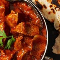 Lamb Rogan Josh · Tender pieces cooked in old Kashmiri style flavored with cardamoms, Kashmiri chilies, cloves...