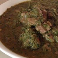 Lamb Saagwala · Cubes of lamb cooked with the blanched spinach, garlic, cardamom, onions and tomatoes.
