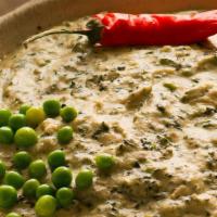 Methi Malai Mutter · Indian cheese, chopped fresh fenugreek, green peas and selected spices cooked in rich gravy ...