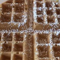Golden Brown Waffle · Crisp and delicious with butter and syrup.