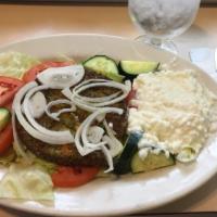 Veggie Burger · Served with lettuce and tomato.