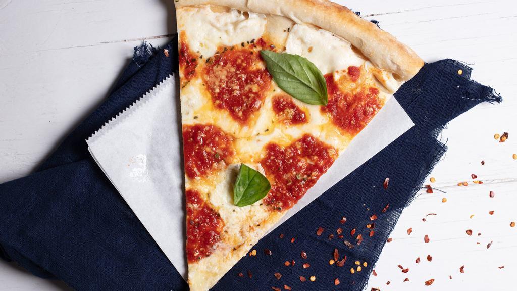 Margherita Pizza · Fresh mozzarella, marinara sauce, fresh basil and olive oil.