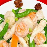 Cs 10. House Special Seafood Delight/ 特色小炒王 · House Special Seafood Delight with Jumbo Prawn, Scallops and Squids together with fresh vege...