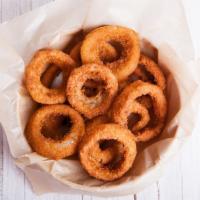 Onion Rings · Golden & crispy onion rings salted to perfection.