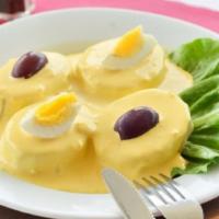 Papa A La Huancaina · Peruvian potato salad boiled potatoes smothered in a mildly spicy cheese sauce.