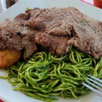 Tallarines Verdes Con Bisteck · Spaghetti with the peruvian version of pesto, made with spinach and basil. With steak and br...