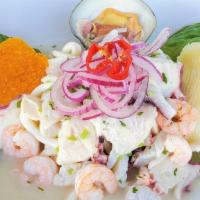 Ceviche Mixto · Fresh pieces of cold fish, mussels squid & baby prawns marinated in lime juice, onions, cori...