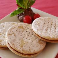 Alfajores (2 Unit) · Two melt-in your mouth bread-like cookies sandwiched in silky smooth manjar blanco (Dulce de...