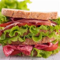 Salami Sandwich · Delicious and fresh salami served with lettuce, tomato, and mayo.