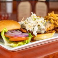 Jamaican Jerk Chicken · Jerk rubbed grilled chicken topped with slaw, pepper jack cheese, jerk sauce.