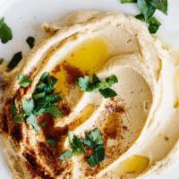 Traditional Hummus · Chickpeas, garlic, lemon, tahini. Served with mixed pickles. +$2 for cucumbers and carrots. ...