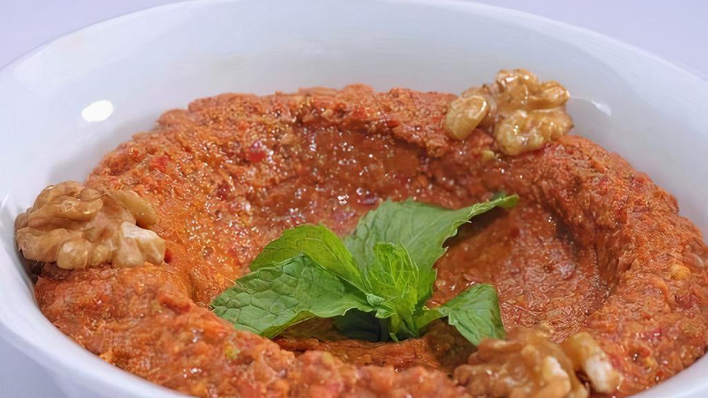 Muhammara · Walnuts, fresh red pepper, red pepper paste, pomegranate molasses, bread crumbs, Le Souk special spices. GF upon request, vegetarian, vegan