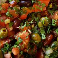 Olive Salad · Black and green olives, parsley, tomato, onion, pomegranate syrup.