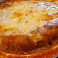Pizza Knish · Pan baked in pizza sauce and cheese.