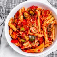 Pasta Primavera · Eat n' run's exclusive tomato basil sauce over fresh vegetables and pasta.
