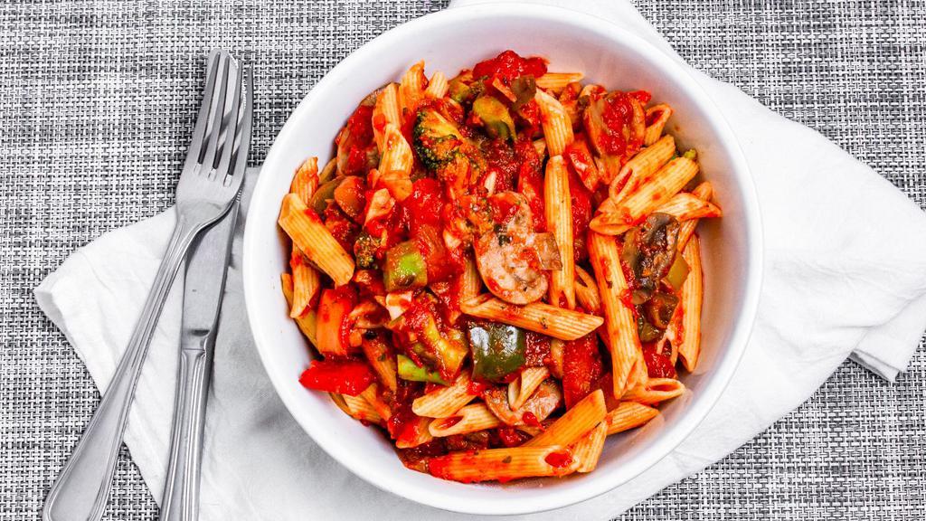 Pasta Primavera · Eat n' run's exclusive tomato basil sauce over fresh vegetables and pasta.