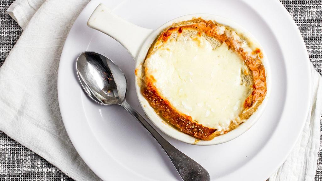 French Onion Soup · The best french onion soup with bread or croutons and melted cheese.