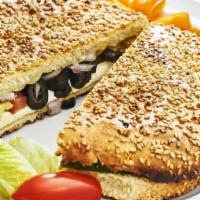Tuna Panini · Tuna pánini with choice of three salad bar toppings grilled to perfection on our pánini pres...
