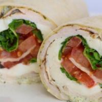 Fresh Mozzarella Wrap · Our in-house fresh mozzarella with Sun-dried Tomatoes, roasted red peppers, and yellow peppe...