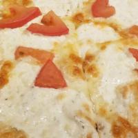Fresh Mozzarella Pizza · Gourmet brick oven baked pizza with our in-house produced fresh mozzarella, roasted plum tom...
