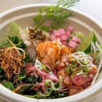 Poke · Marinated yellowtail, salmon and tuna, daikon and cucumber salad, mixed seaweed salad, and d...